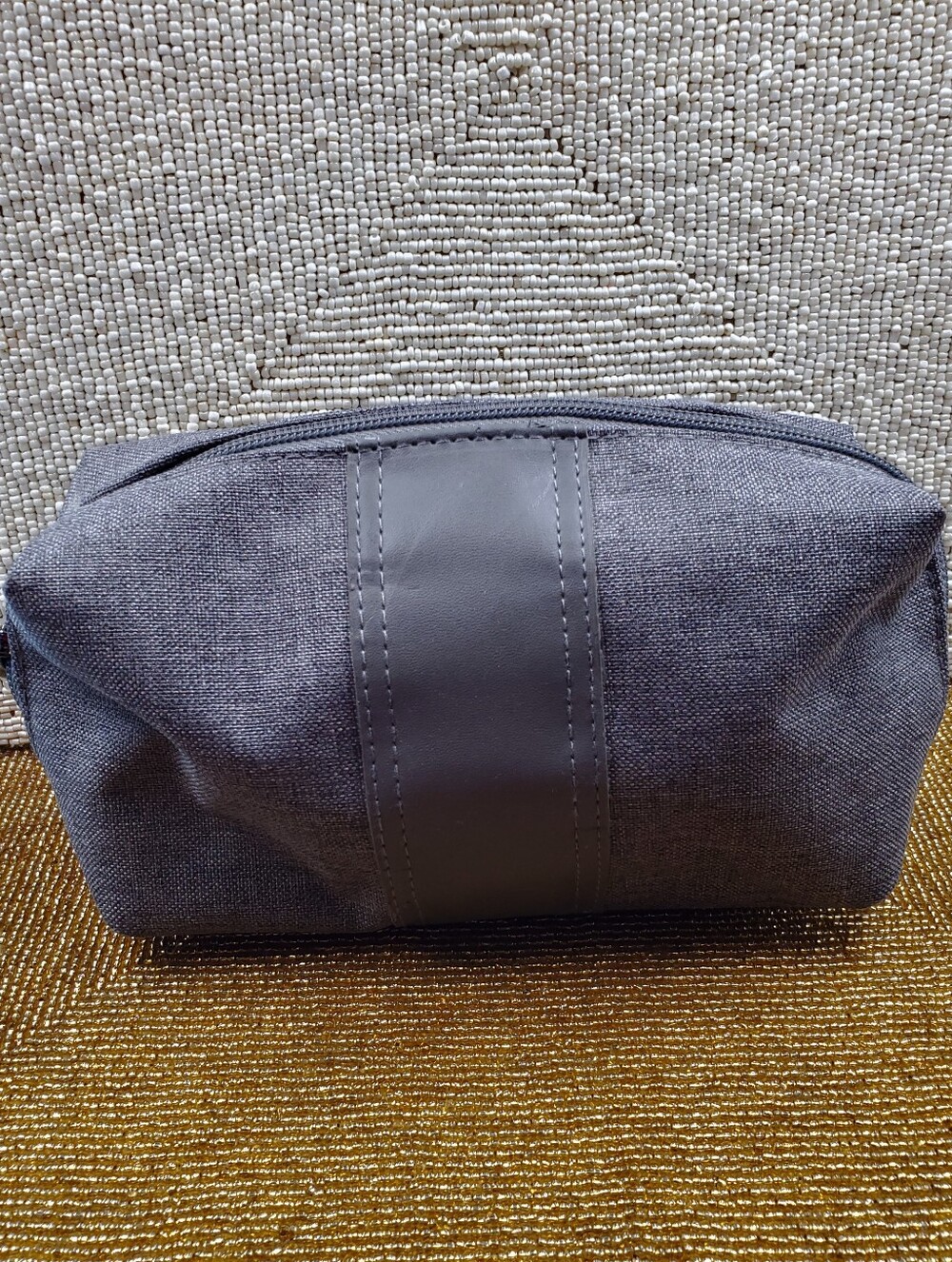 Emirates BVLGARI Gray Toiletry Bag crafted with a minimalist aesthetic (**)
